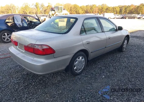 1999 Honda Accord Lx z USA, uszkodzony, nr VIN 1HGCG5647XA035852